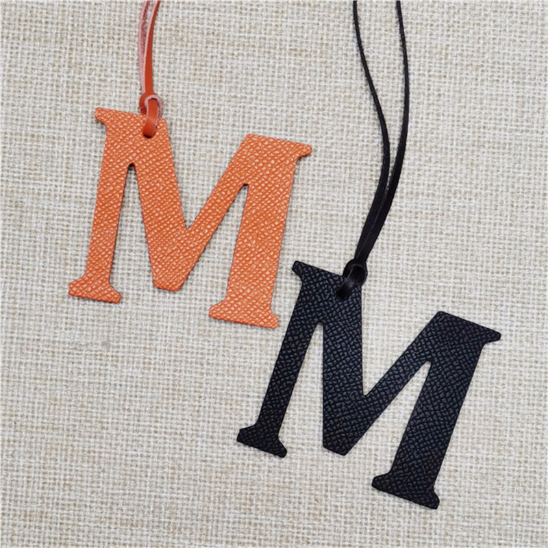 XMESSUN 新しい英語文字 M チャーム高級本物の天然皮 - Monogram Keychain Leather のレビューと価格